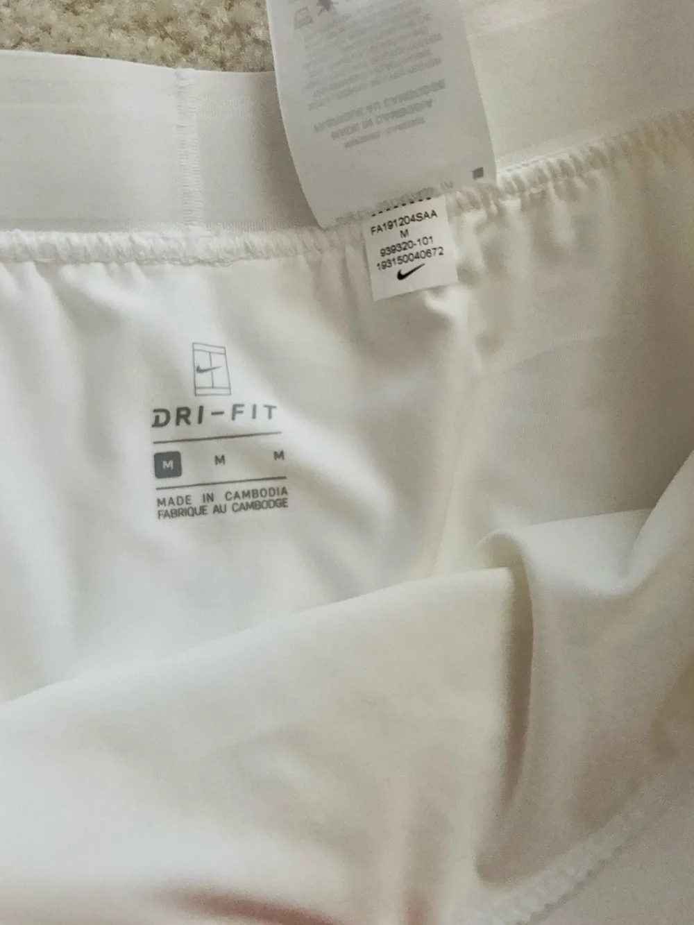 Nike White Women’s Tennis Skort with Black Swoosh